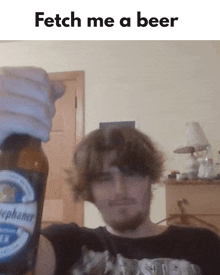 a man is holding a bottle of beer with the words fetch me a beer below him