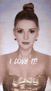 a woman with a bun on her head says " i love it "
