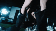 a person 's face is visible in a blurry photo taken by a person named j.i.f.o.