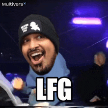 a man wearing a beanie and a blue sweater with the word lfg written on it