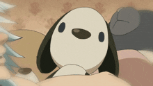 a cartoon dog is laying on a person 's stomach