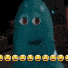 a close up of a young man 's face with a row of laughing emojis behind him