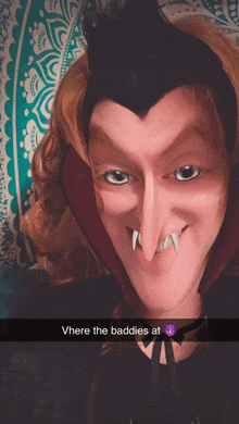 a picture of a person dressed as a vampire with a caption that says where the baddies at