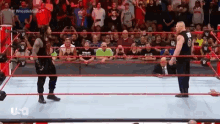Roman Reigns Brock Lesnar GIF - Roman Reigns Brock Lesnar Stare Down GIFs