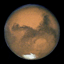 a close up of the planet mars with a white spot in the middle