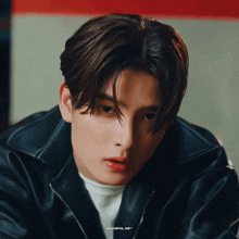 a close up of a young man 's face with the words khunpol gif below him