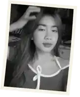 a black and white photo of a woman 's face