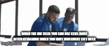 two men are sitting in front of a laptop with a caption that says when the rim tells you can use still move