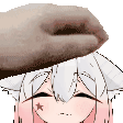 a close up of a person 's hand on a girl 's head .