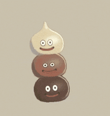three cartoon characters are stacked on top of each other with smiley faces