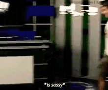 a blurred image of a person with the words * is sassy * in the corner