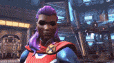 a woman with purple hair and a red cape with an x on her chest
