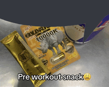 a package of goldrush 10000k sits next to a red bull