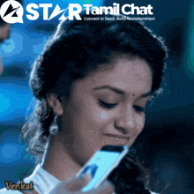 a star tamil chat ad with a woman looking at a cell phone