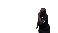 a man in a black shirt with a shield on it is dancing