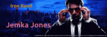 a man in a suit and tie with the name jemka jones on the bottom right