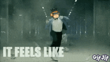 a monkey in a tuxedo is dancing with the words it feels like below him