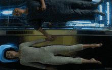 two people laying on their backs with the word kepler in the bottom right corner