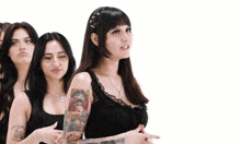 a woman with a tattoo on her arm that says ' i love you ' on it