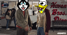 a husky and a duck are standing next to each other in front of a haren bros. diner