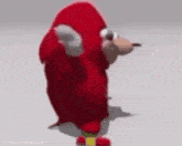 a 3d model of knuckles the echidna from sonic the hedgehog dancing .