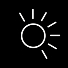 a white sun icon on a black background