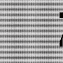 a black and white checkered background with a few dots on it .