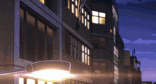 a building with a lot of windows and a street light