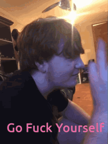 a picture of a person with the words go fuck yourself