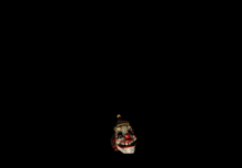 a clown with a microphone in its mouth