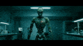 a robot with a light coming out of its chest is in a dark room