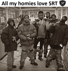 a group of young men are posing for a picture with the caption all my homies love srt