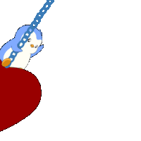 a penguin sitting on top of a red heart