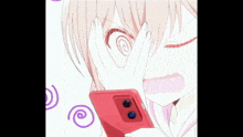 a girl is covering her face with her hand while looking at a red cell phone .