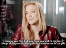 a woman in a red leather jacket is talking about doing more things than she normally does