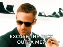 a man wearing sunglasses is smoking a cigarette and saying `` excuse the fuck outta me '' .