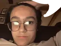 a close up of a person wearing glasses