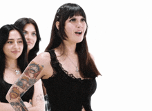 a woman with a tattoo on her arm that says ' aa '