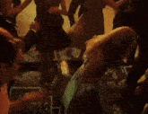 a woman in a green dress is upside down on the floor
