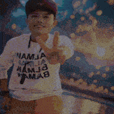 a man wearing a shirt that says namja mama