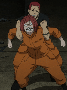 tokyoffs is written on the back of a man 's orange uniform