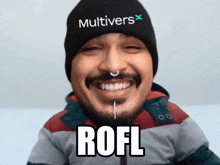 a man wearing a beanie that says multivers x rofl