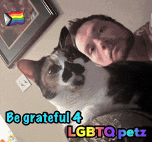 a picture of a man and a cat with the words be grateful 4 lgbtq petz on the bottom