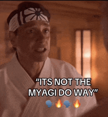 a man with a headband on his head says " it 's not the myagi do way "