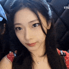 a close up of a woman 's face with the word studio visible in the corner