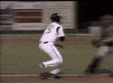a baseball player with the number 5 on his shirt