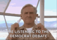 Funny Cleaning Ears GIF - Funny Cleaning Ears Democrat Debate GIFs