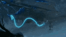 a person is standing in the snow with a blue light coming out of them