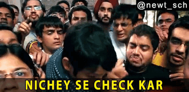 a crowd of people with the words nichey se check kar