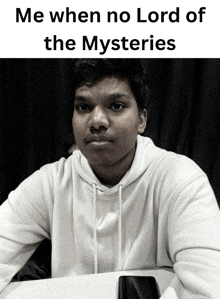 a black and white photo of a young man with a caption that says me when no lord of the mysteries